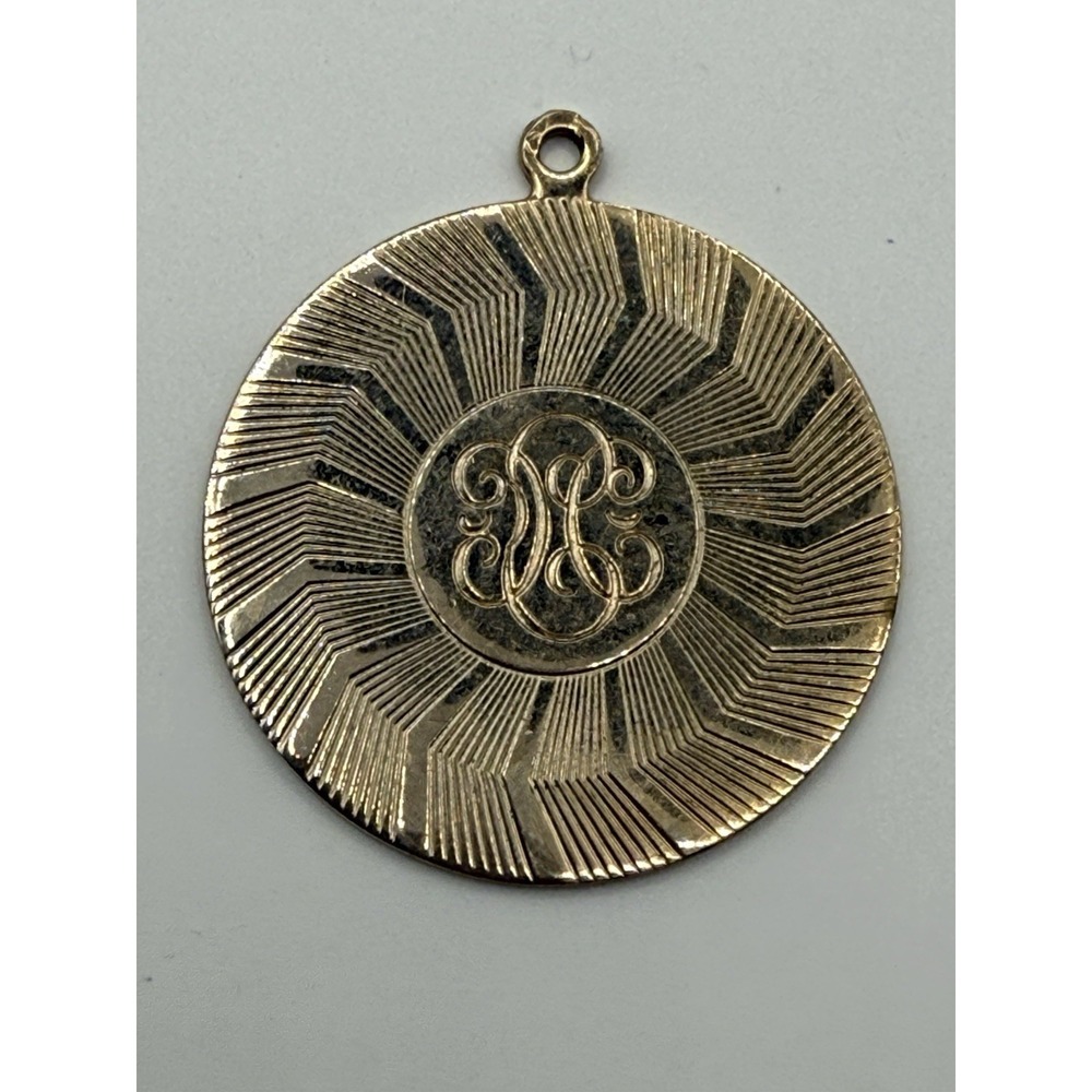 Karu Arke Gold Toned Medallion Pendant Necklace Accessory